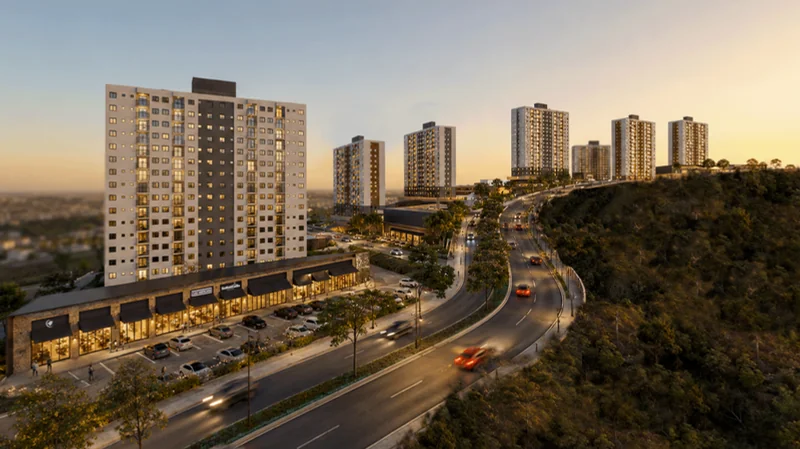 Vista aérea das torres do empreendimento junto à área verde preservada