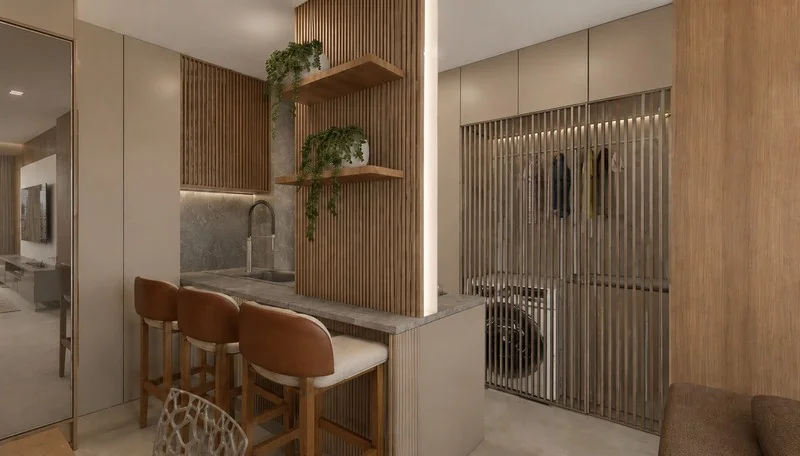 Área de serviço do apartamento, com máquina de lavar e armário